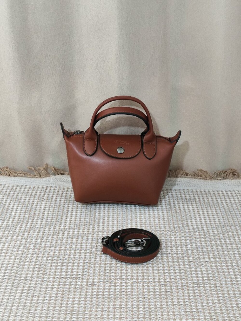 Longchamp cognac-colored handbag with shoulder strap